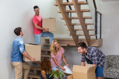 Boxes and furniture showing cubic-yard load-based pricing
