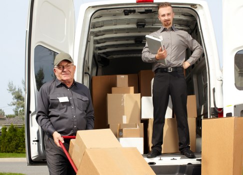 Removal team preparing a move in Swiss Cottage near residential flats