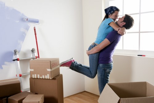 Worker using correct lifting technique during a move