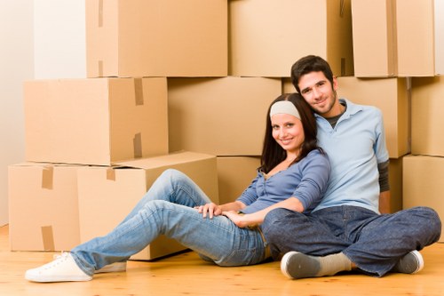 Local movers handling boxes and furniture near Swiss Cottage streets