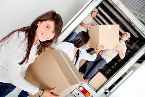 Packing and moving boxes during a Swiss Cottage relocation